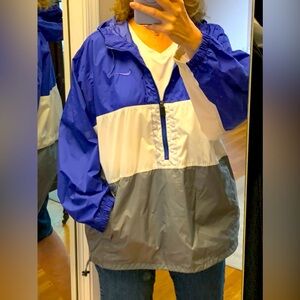 Nike windbreaker tricolored jacket.  Size large but runs big.  Xl=Large.
